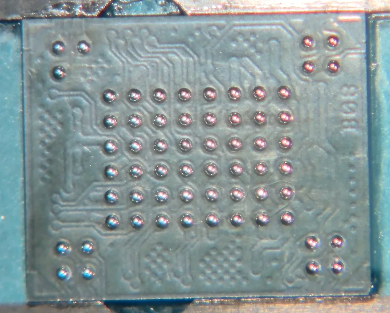 Microscope view of the reballed and cleaned BGA63 flash-memory package from a Motorola APX900 radio.